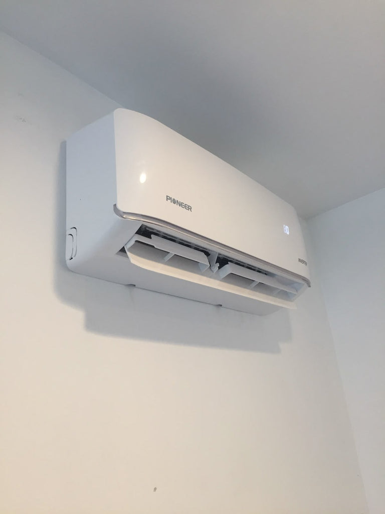 Compact wall mounted air conditioner heater with cooling and heating functions for bedrooms and small spaces