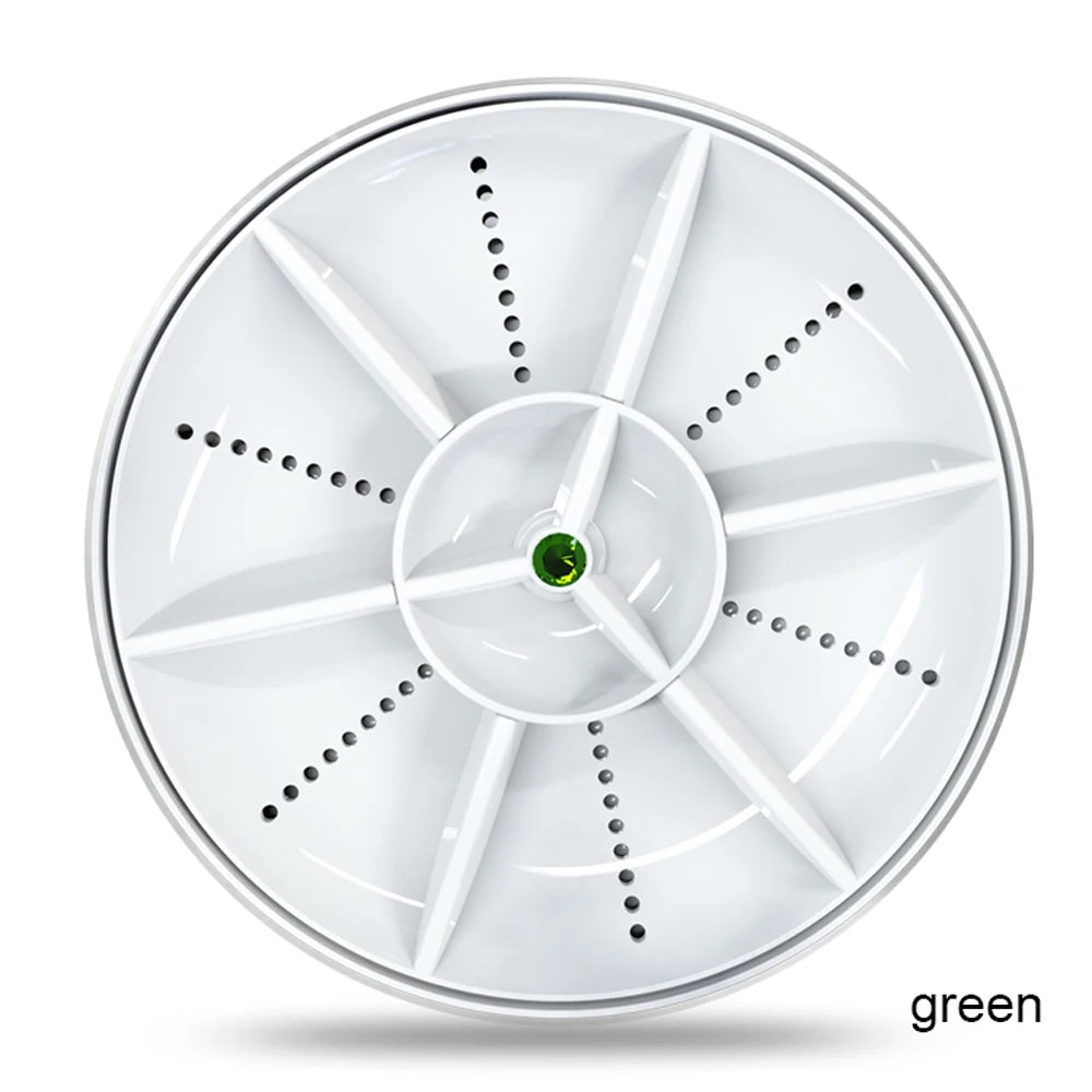White circular object with a green center on a white background