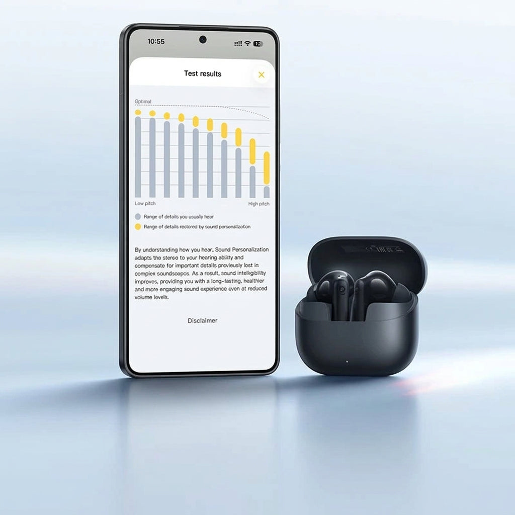 Smartphone displaying sound testing app with wireless earbuds and charging case on a light blue background